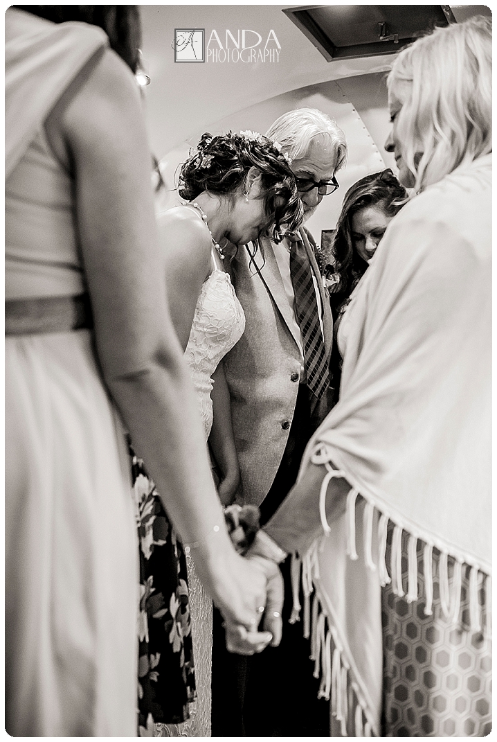 Anda Photography, creative photography, chic, artistic photography, unique photography, fall autumn wedding, vibrant colors, lifestyle photography, on location photography, Bellingham engagement photography, Bellingham wedding photography, Seattle wedding photography, Seattle engagement photography, creative wedding photography, unique wedding photography, vibrant images, photojournalistic photography, seattle wedding photography, seattle engagement photography, casual photography style, emotional wedding images, Wandering Waters, camping themed wedding, retro airstream trailer, old school trailerworks, wedding prep in an airstream trailer, rainy wedding day, outdoor wedding, backless wedding dress, Mychal, Daniel