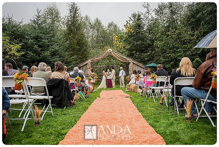 Anda Photography, creative photography, chic, artistic photography, unique photography, fall autumn wedding, vibrant colors, lifestyle photography, on location photography, Bellingham engagement photography, Bellingham wedding photography, Seattle wedding photography, Seattle engagement photography, creative wedding photography, unique wedding photography, vibrant images, photojournalistic photography, seattle wedding photography, seattle engagement photography, casual photography style, emotional wedding images, Wandering Waters, camping themed wedding, retro airstream trailer, old school trailerworks, wedding prep in an airstream trailer, rainy wedding day, outdoor wedding, backless wedding dress, Mychal, Daniel